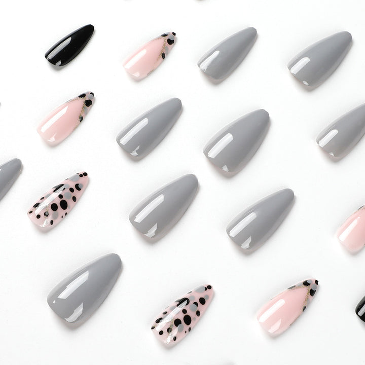 Artful stiletto nails with elegant accent design Stornfield