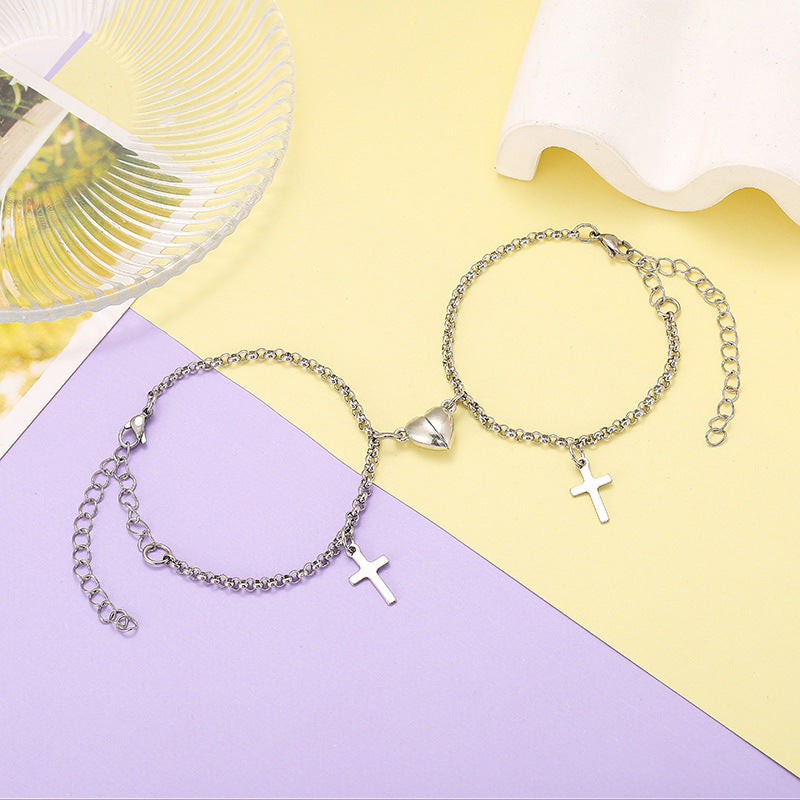 Versatile bracelet with cross and heart pendants Stornfield