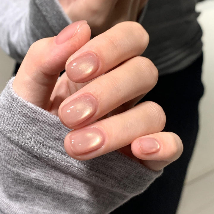 Shiny artificial nails with natural effect Stornfield