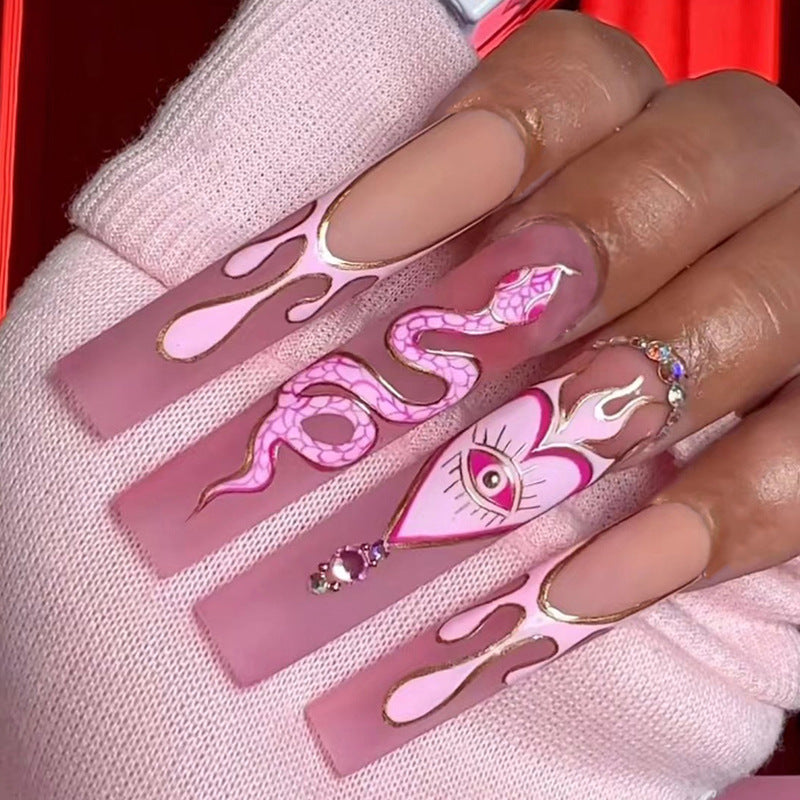 Artful Nail Extensions with Snake and Flower Decoration Stornfield