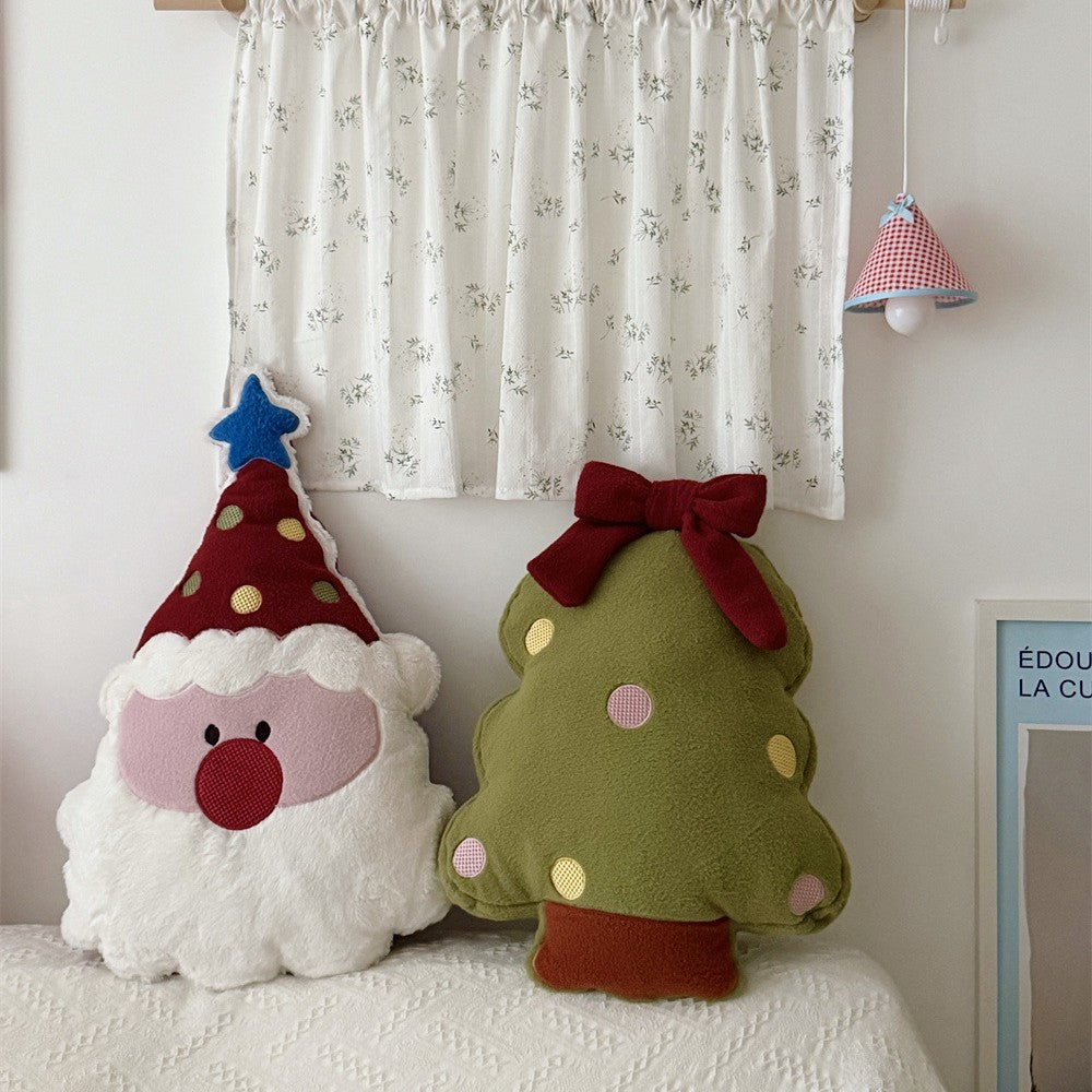Christmas cuddle pillow in Santa face with soft plush cover and appliqués