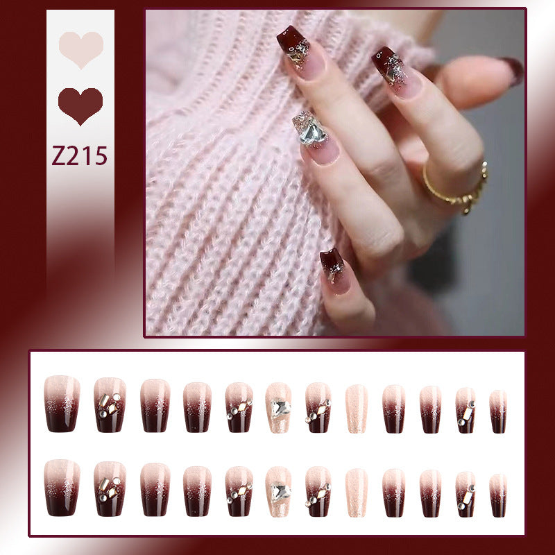 Artificials nails with glitter embellishments and elegant accents Stornfield