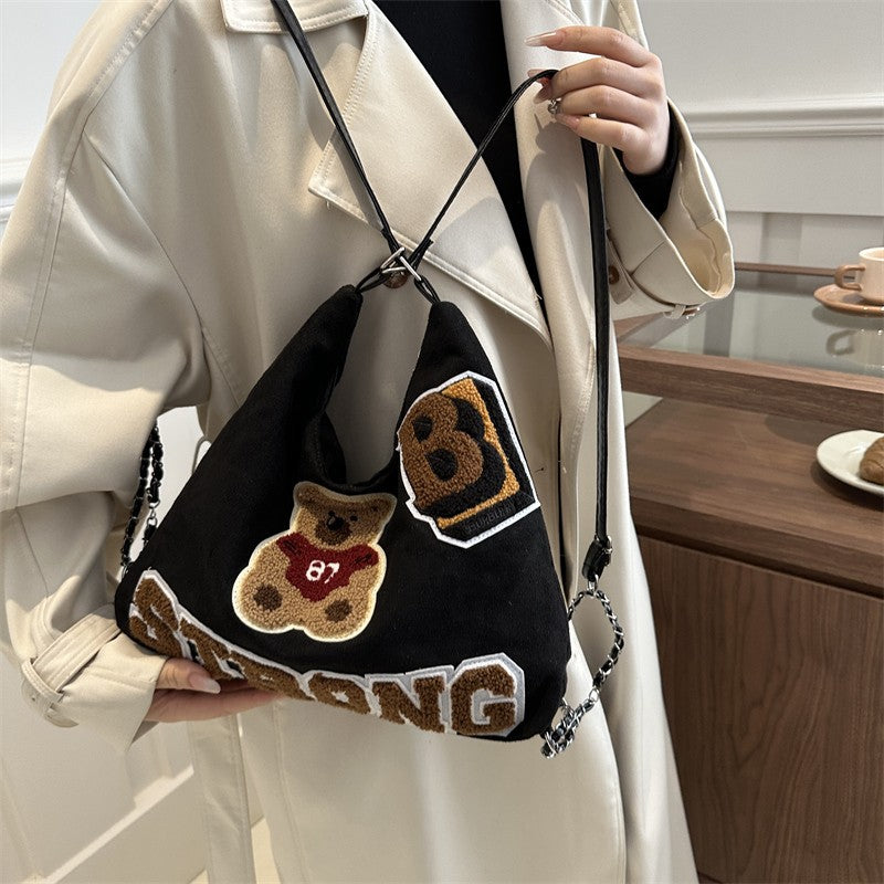 Shoulder bag in playful bear pattern Stornfield