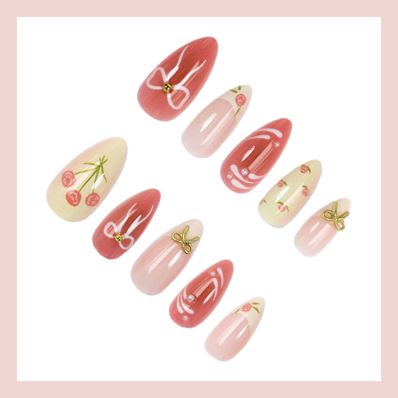 Artificial nail set with floral accents and elegant glitter Stornfield