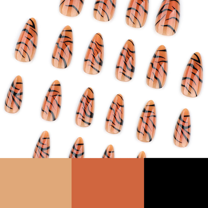 Artful stiletto nails with creative tiger stripe design Stornfield