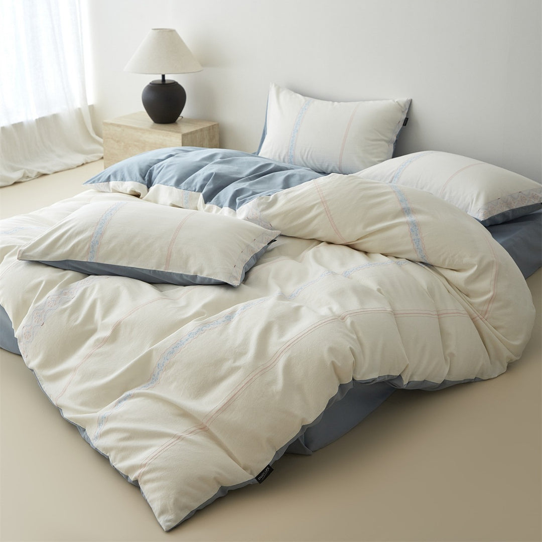 Reversible Cotton Sateen Duvet Cover Set with Decorative Embroidered Stripe and Matching Pillow Shams