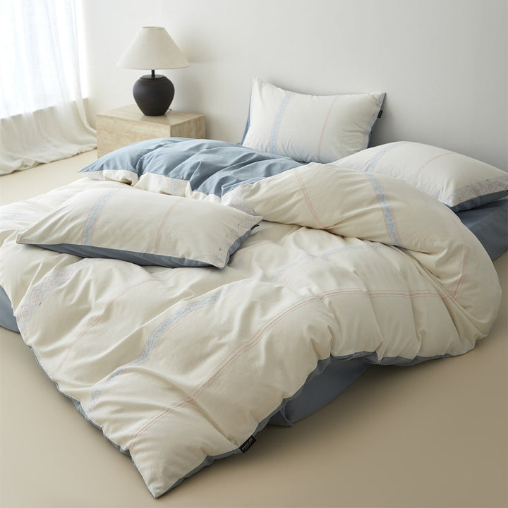 Reversible Cotton Sateen Duvet Cover Set with Decorative Embroidered Stripe and Matching Pillow Shams