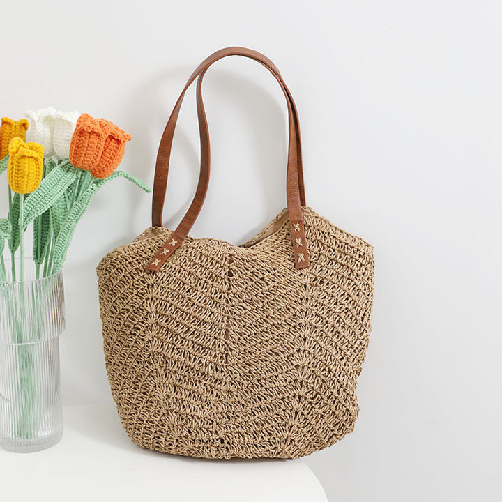 Braided basket bag with sturdy leather handles Stornfield