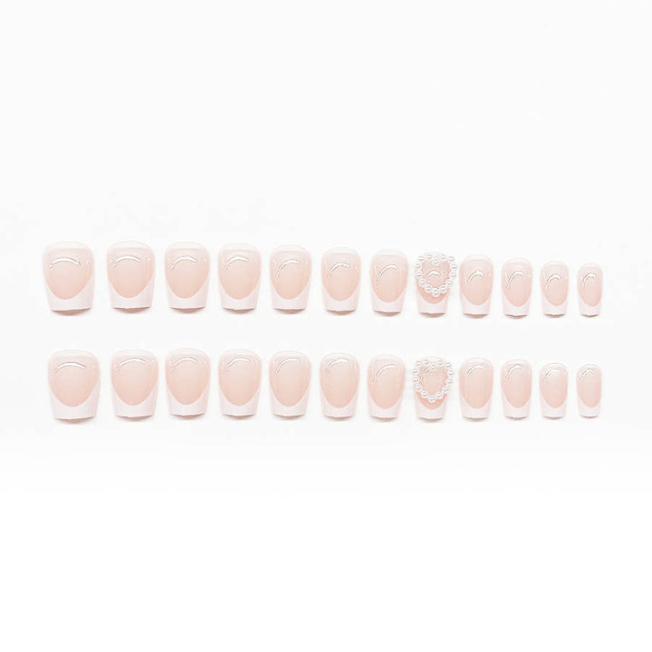 Artificial nails with elegant heart decorations Stornfield