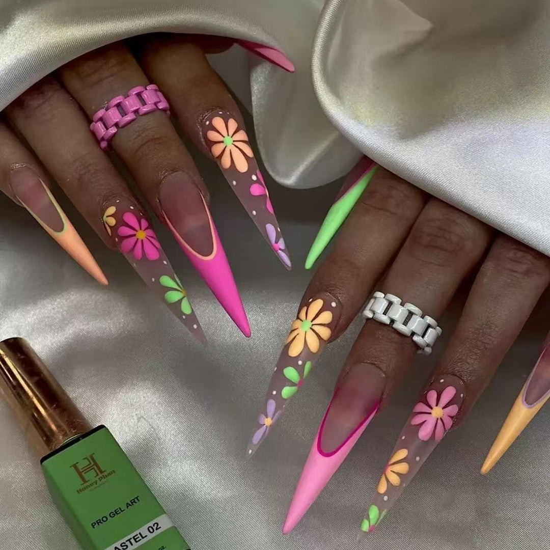 Artificial nail set with playful flower design and elegant high-gloss finish Stornfield