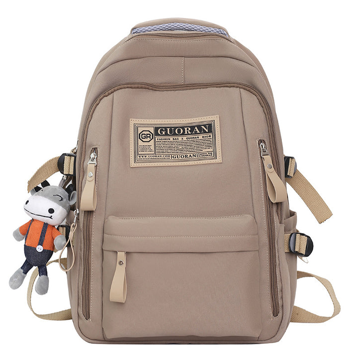 Versatile Casual Backpack with Plush Keychain