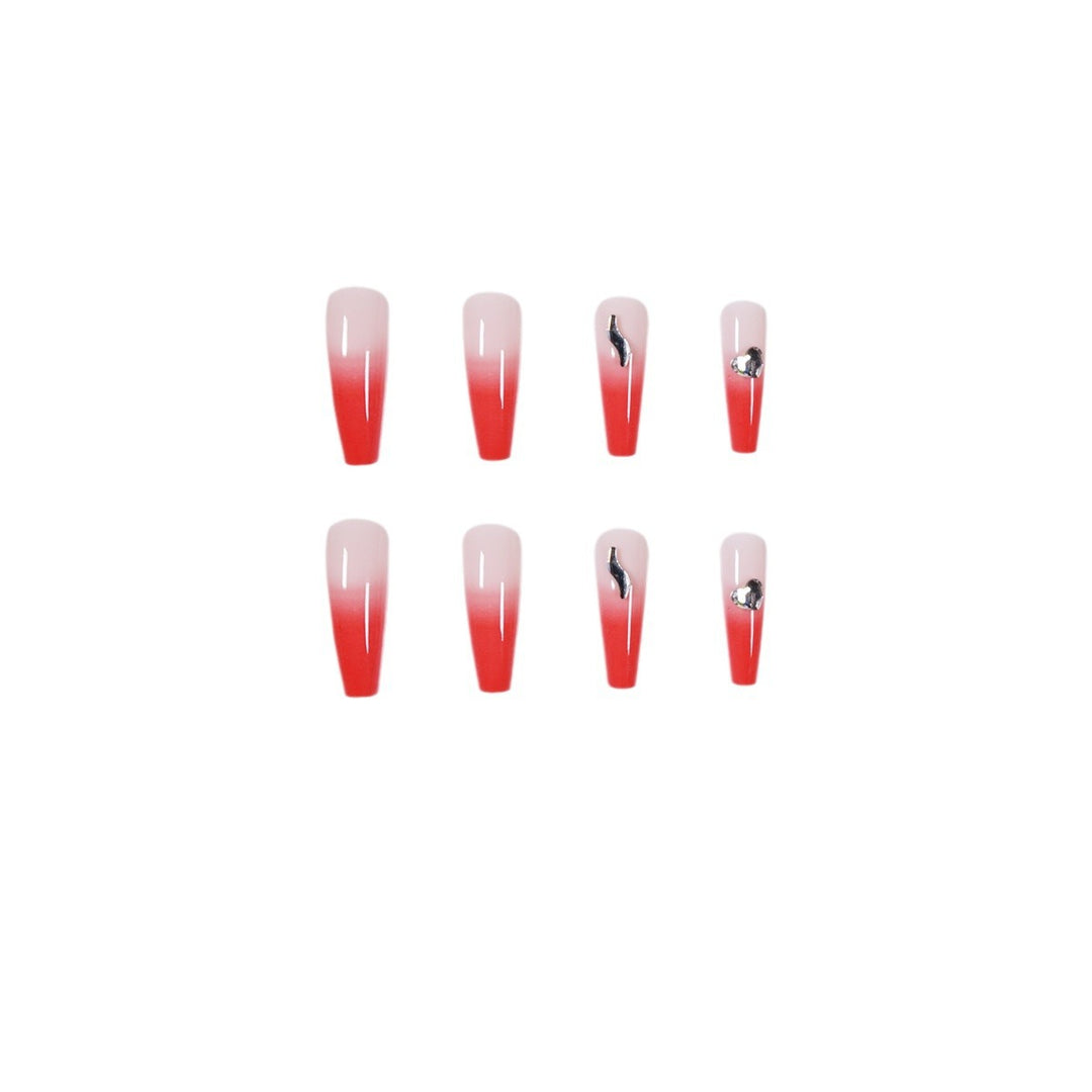 Artful stiletto nails with elegant gradient and rhinestone embellishment Stornfield
