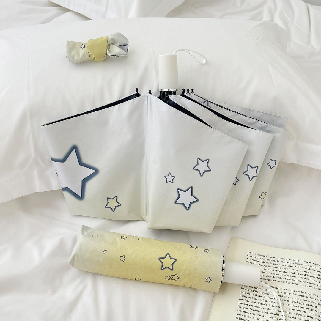 Women's compact folding umbrella with star pattern Stornfield