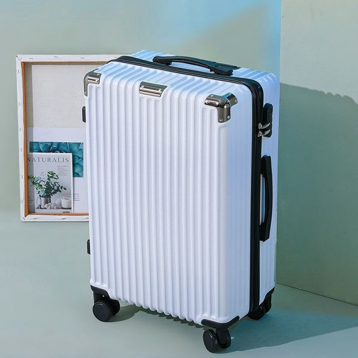 Hard shell suitcase with 360-degree wheel system and integrated safety feature Stornfield