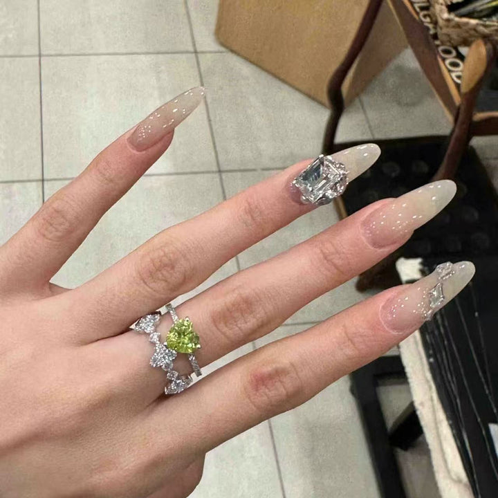 Elegant Stiletto Nail Extensions with Rhinestone Accents Stornfield
