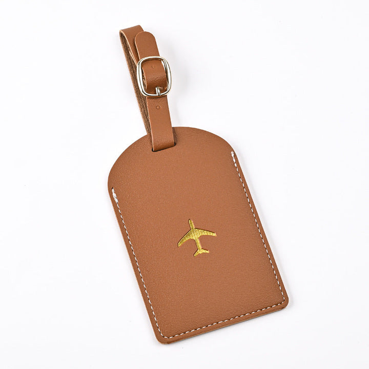 premium leather luggage tag with adjustable buckle strap and embossed airplane Stornfield