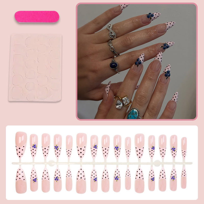 Acrylic nail set with stylish dots and floral embellishments Stornfield