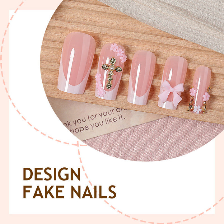 Artificial nail set with glamorous flower and pearl decorations Stornfield