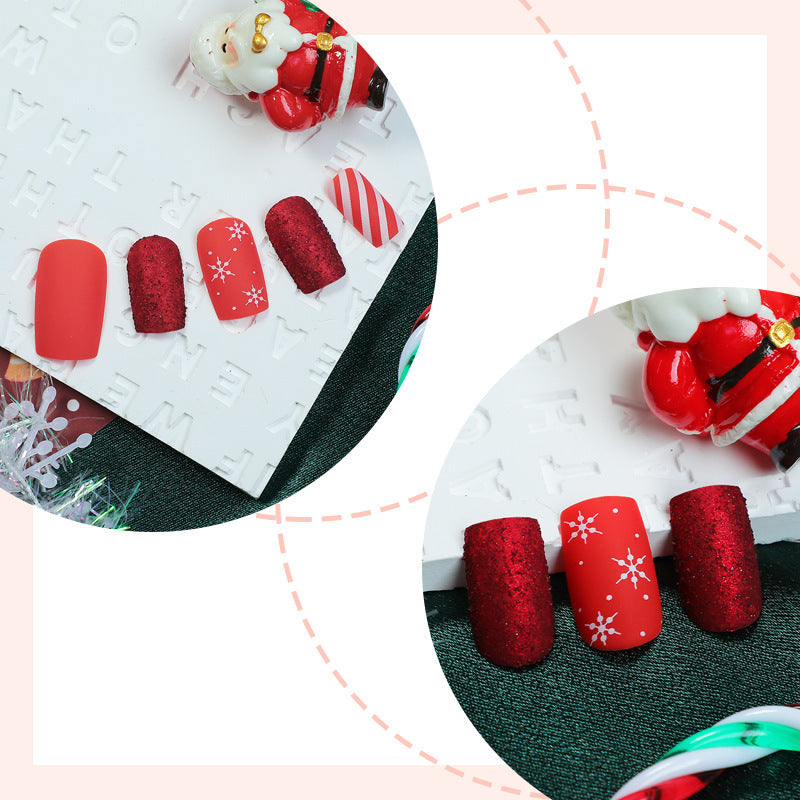 Artificial nail set in festive red with glitter and Christmas motifs Stornfield