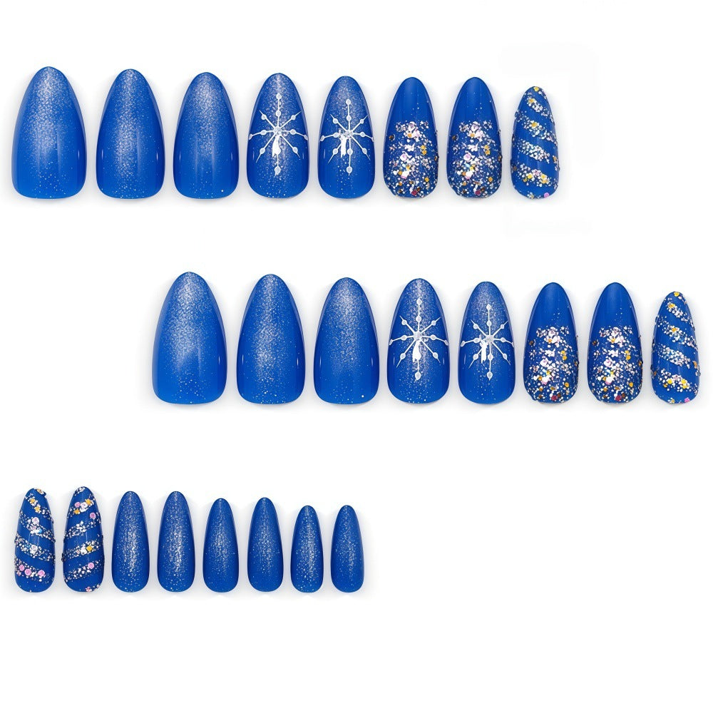 Glamorous artificial nails with glitter and pattern design Stornfield