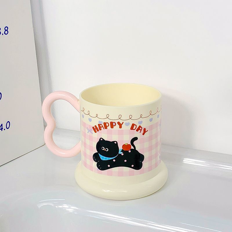 Ceramic mug with playful puppy motif Stornfield