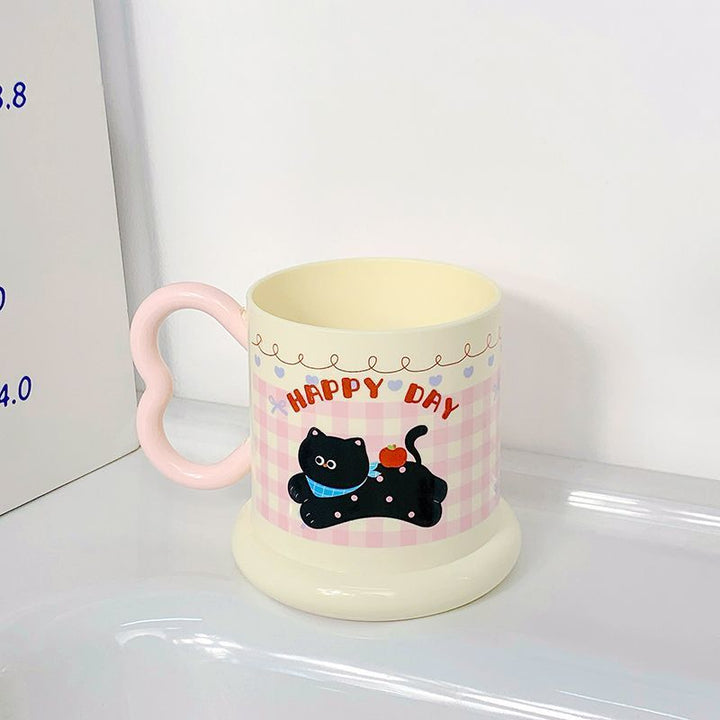 Ceramic mug with playful puppy motif Stornfield