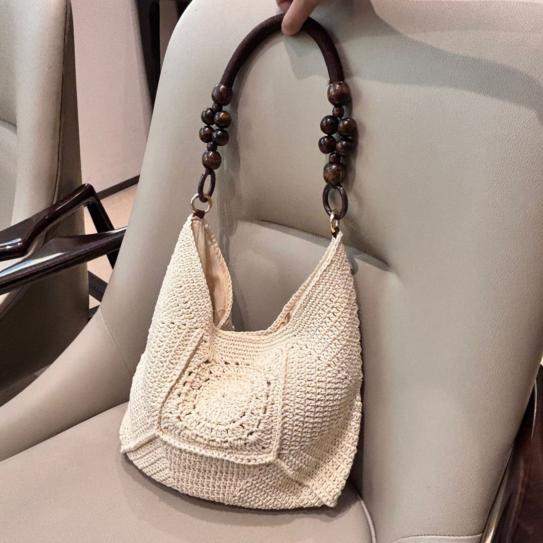 Hand-knotted shoulder bag with wooden handles Stornfield