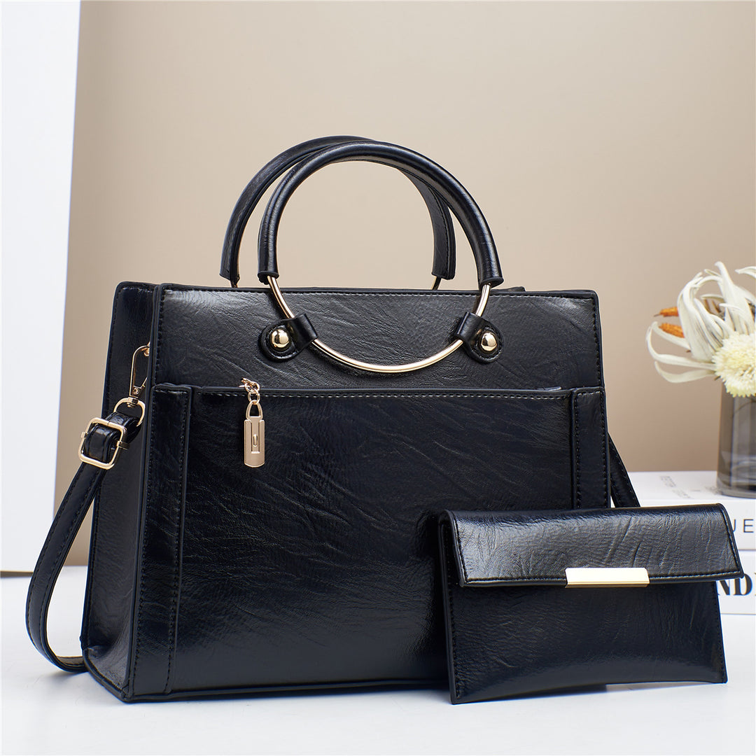 Elegant handbag with detachable shoulder strap and matching wallet Stornfield