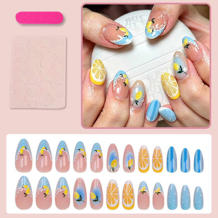 Artificial nail set with cheerful citrus and flower motifs Stornfield