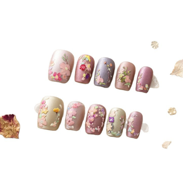 Art nail design with floral motifs Stornfield