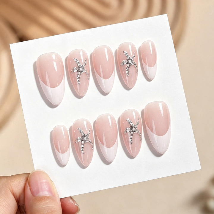 Artificial nail set with elegant French design and sparkling accents Stornfield