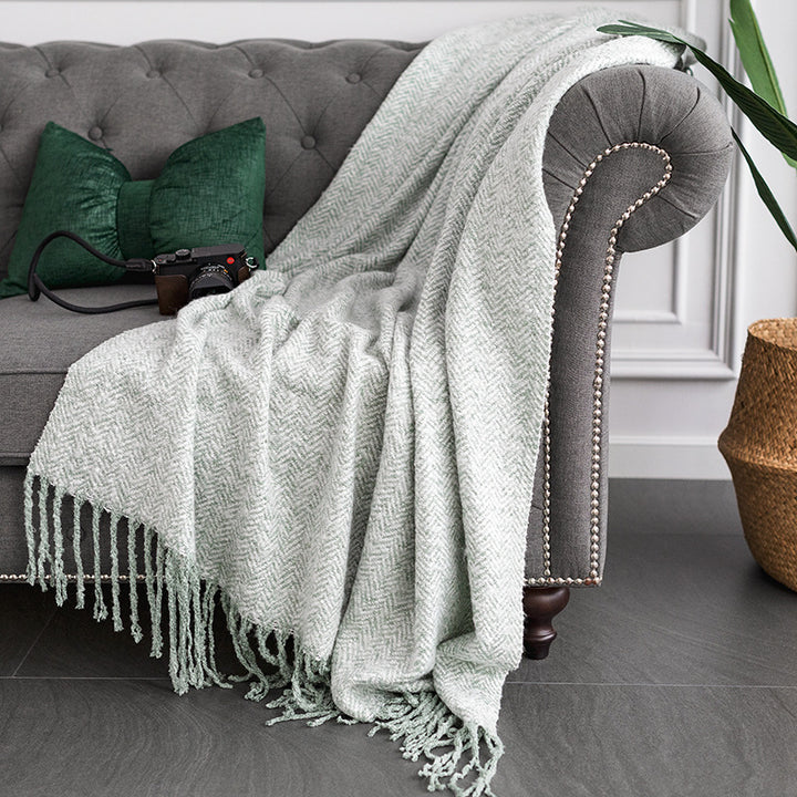 Throw blanket and plaid with herringbone structure, soft cotton blend and decorative fringes Stornfield