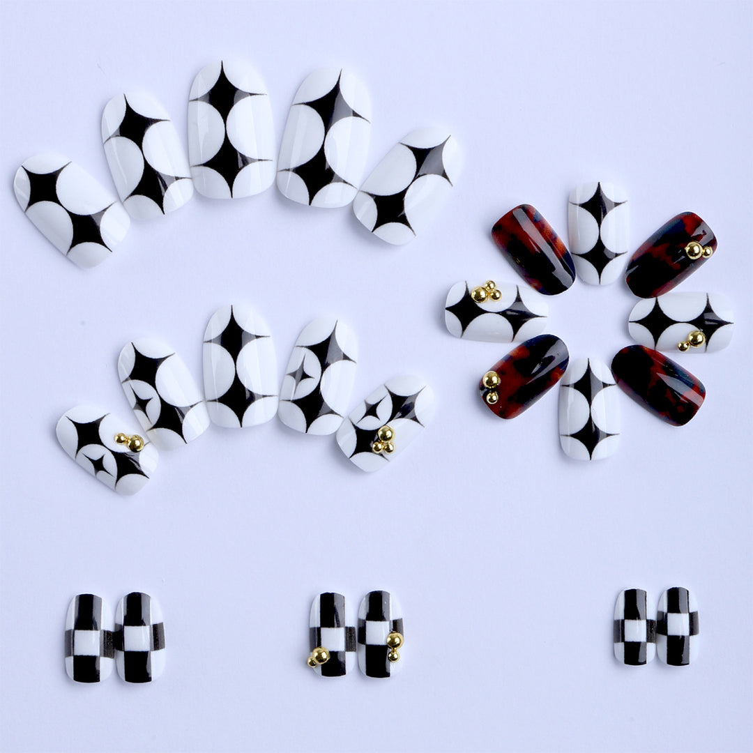 Artificial nails with modern geometric pattern and golden accents Stornfield