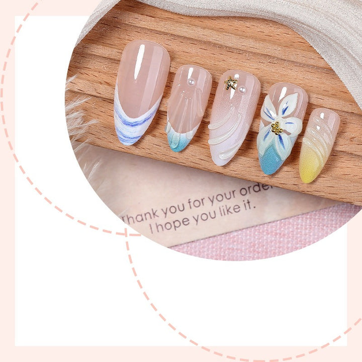 Art nail set with elegant flower design and stylish color gradients Stornfield