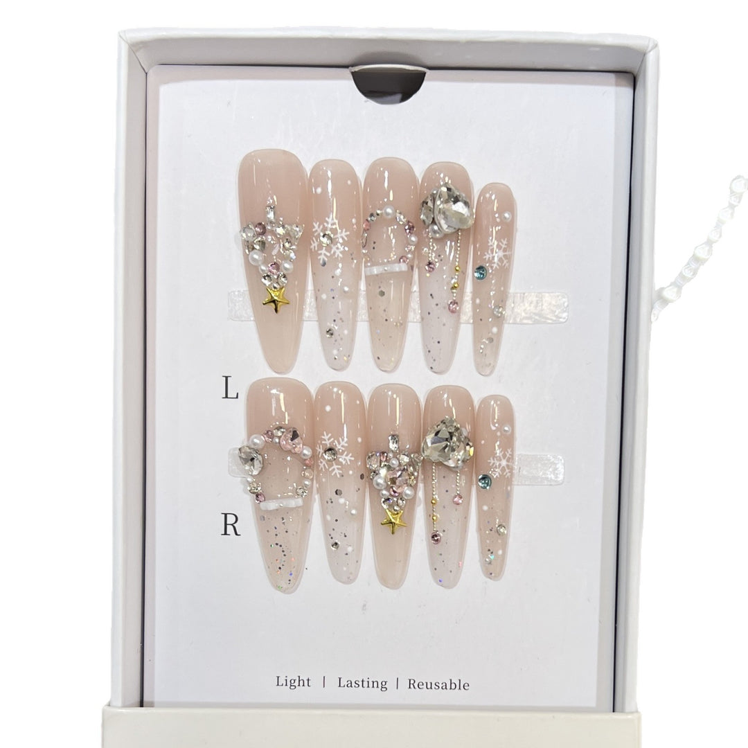 Artistic Press-On Nail Set with Snowflake and Gemstone Designs Stornfield