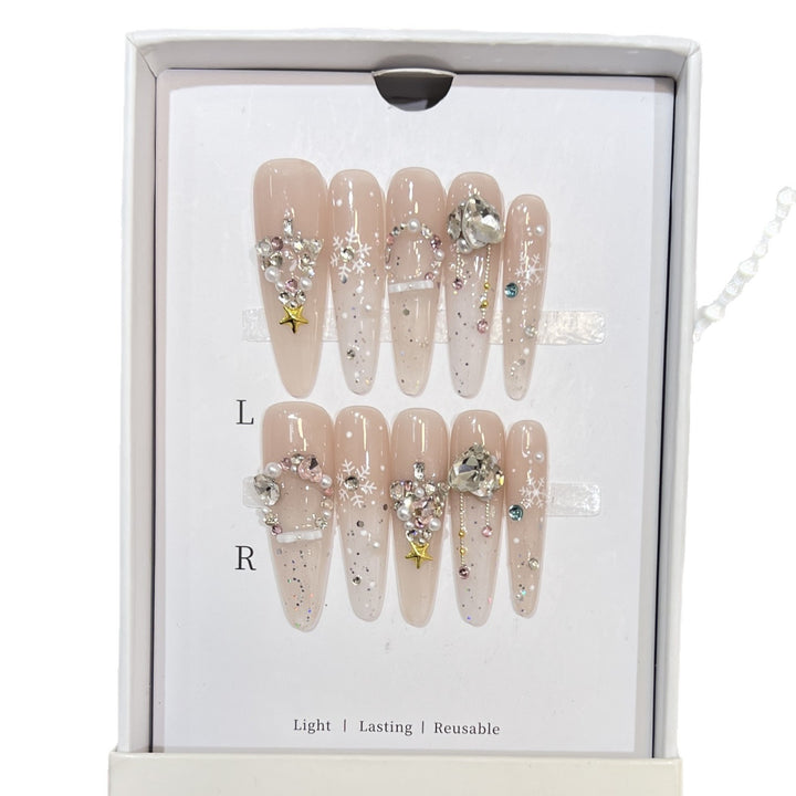 Artistic Press-On Nail Set with Snowflake and Gemstone Designs Stornfield