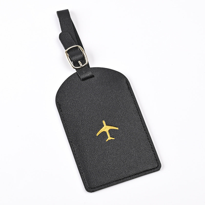 premium leather luggage tag with adjustable buckle strap and embossed airplane Stornfield