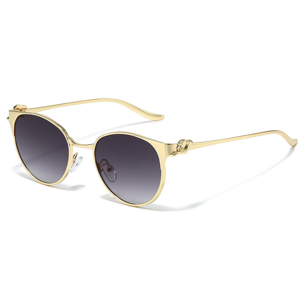 Elegant Cat-Eye Sunglasses with Decorative Gold Accents Stornfield