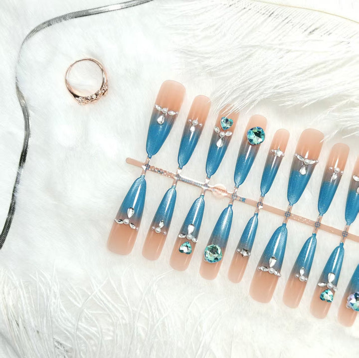Glamorous artificial nails with sparkling rhinestone elements Stornfield