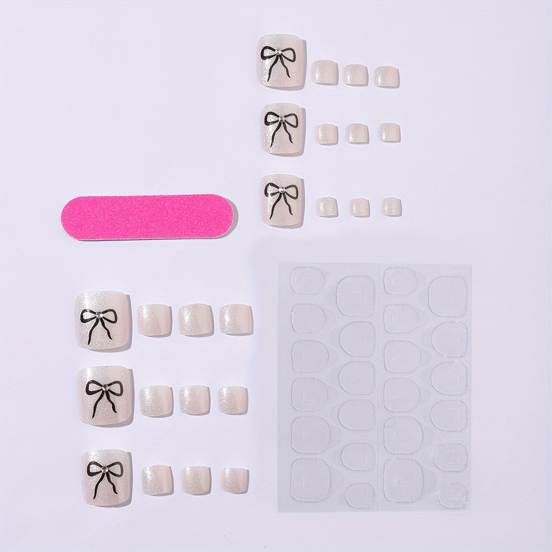 Acrylic nail set with sparkling accents and elegant bows Stornfield