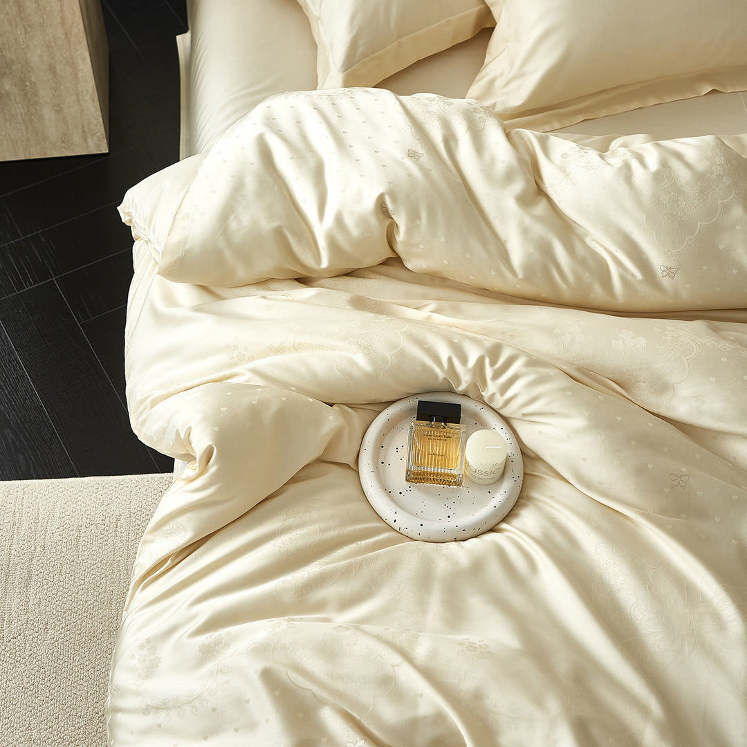 Satin bedding set with silky feel, hotel closure and tone-on-tone pattern
