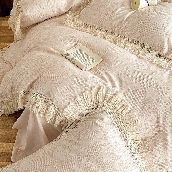 High-quality jacquard bed linen set with decorative fringed trim made of cotton satin