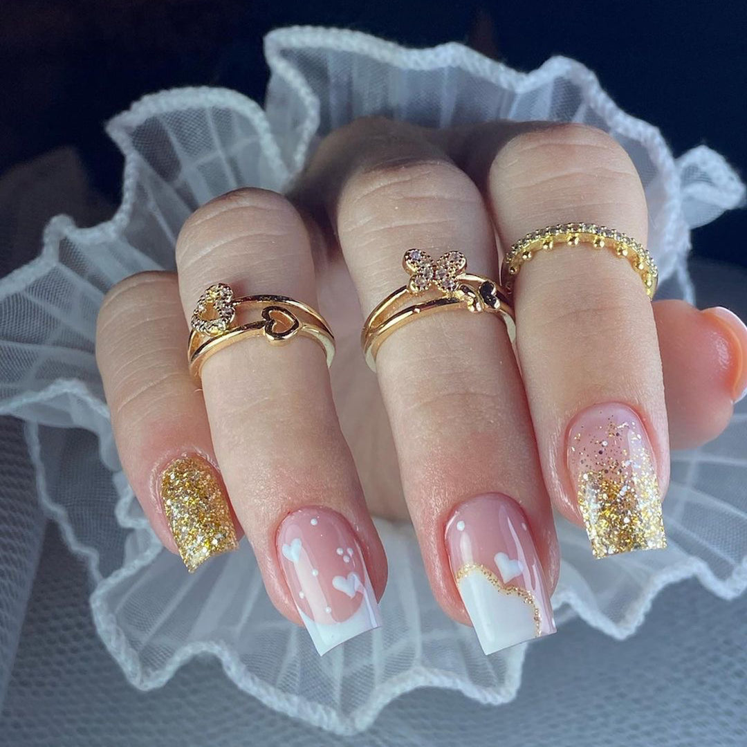 Artful nail extensions with an elegant leaf pattern Stornfield