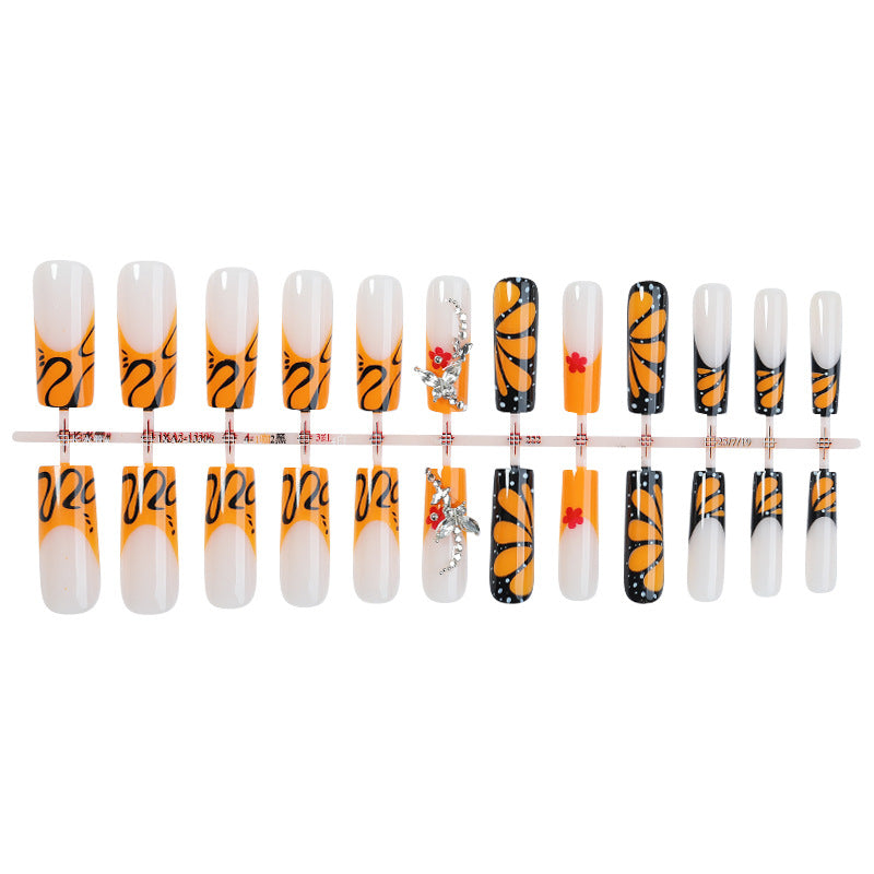 Creative nail set with shimmering floral and geometric designs Stornfield