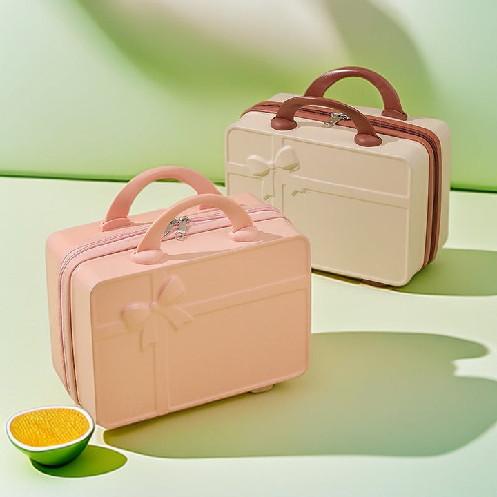 structured hard-shell cosmetic travel case with embossed bow and dual top handles Stornfield