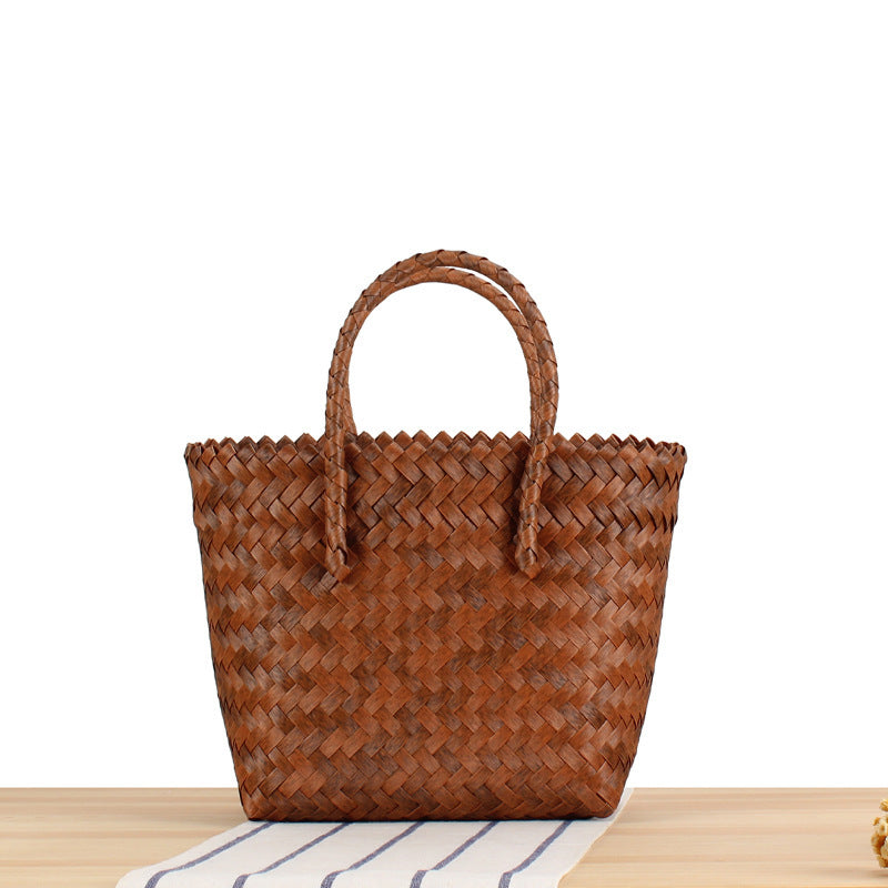 Tote bag made of handwoven natural material with braided design Stornfield