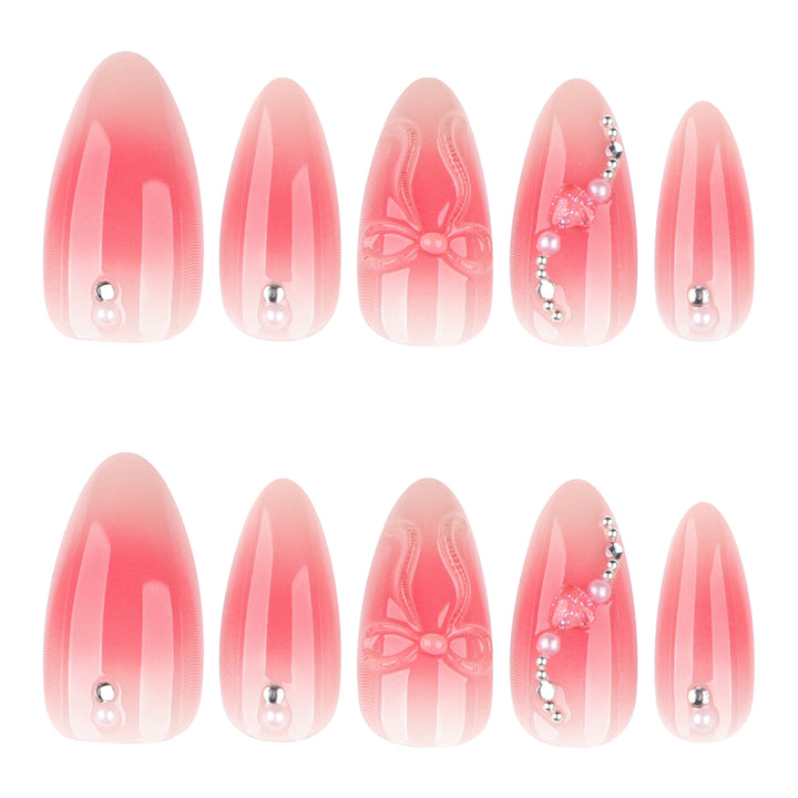 Artful nail extensions with delicate floral accents and glitter Stornfield
