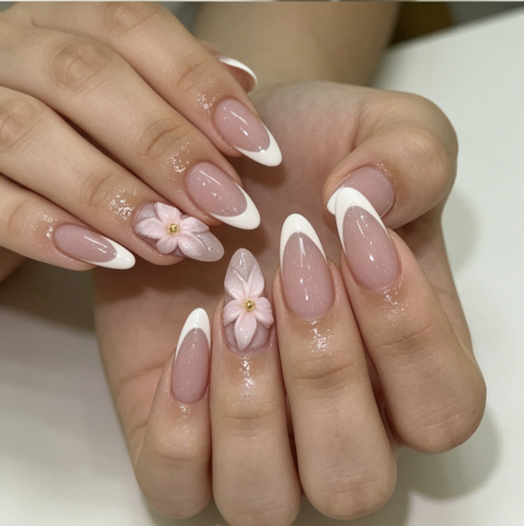 Artificial nails with floral decoration and elegant French tip design Stornfield