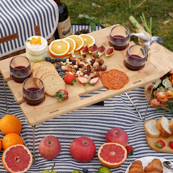 Ladies picnic basket with integrated dinnerware set andStylish folding table Stornfield
