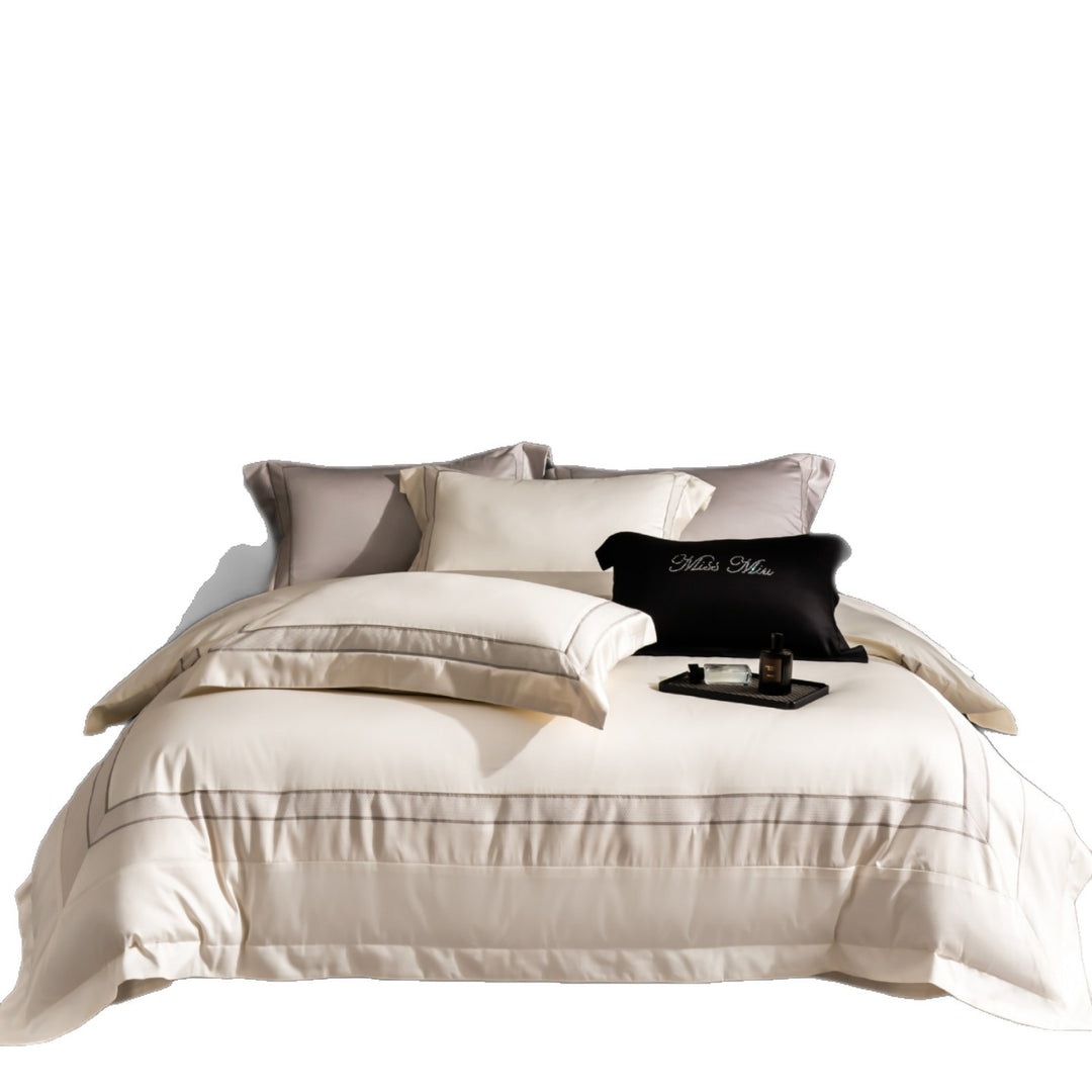 Luxurious cotton bedding set with quilted blanket and fine pillowcases